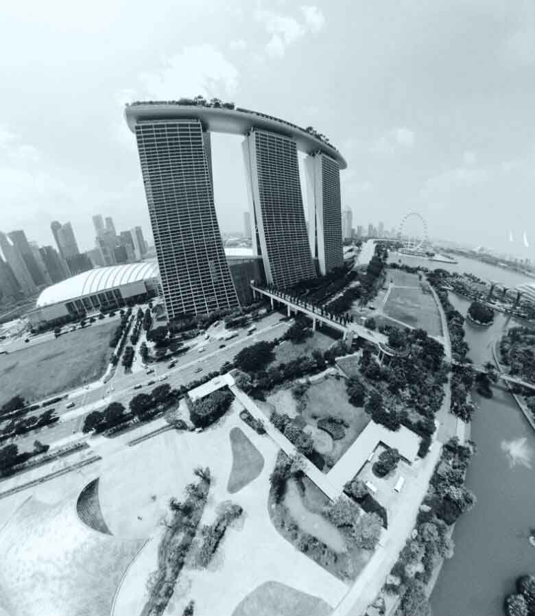 Wide-angle aerial photograph of a waterfront commercial landmark