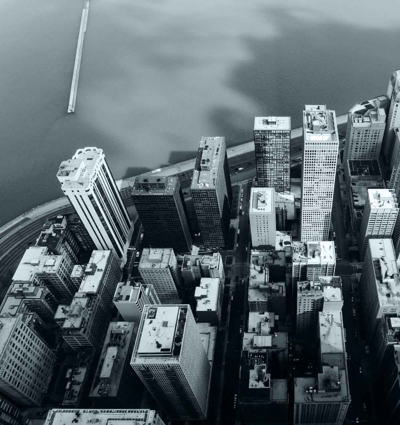 Aerial view of waterfront office towers and commercial buildings